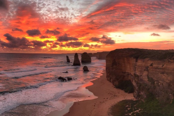 a canyon with a sunset in the background